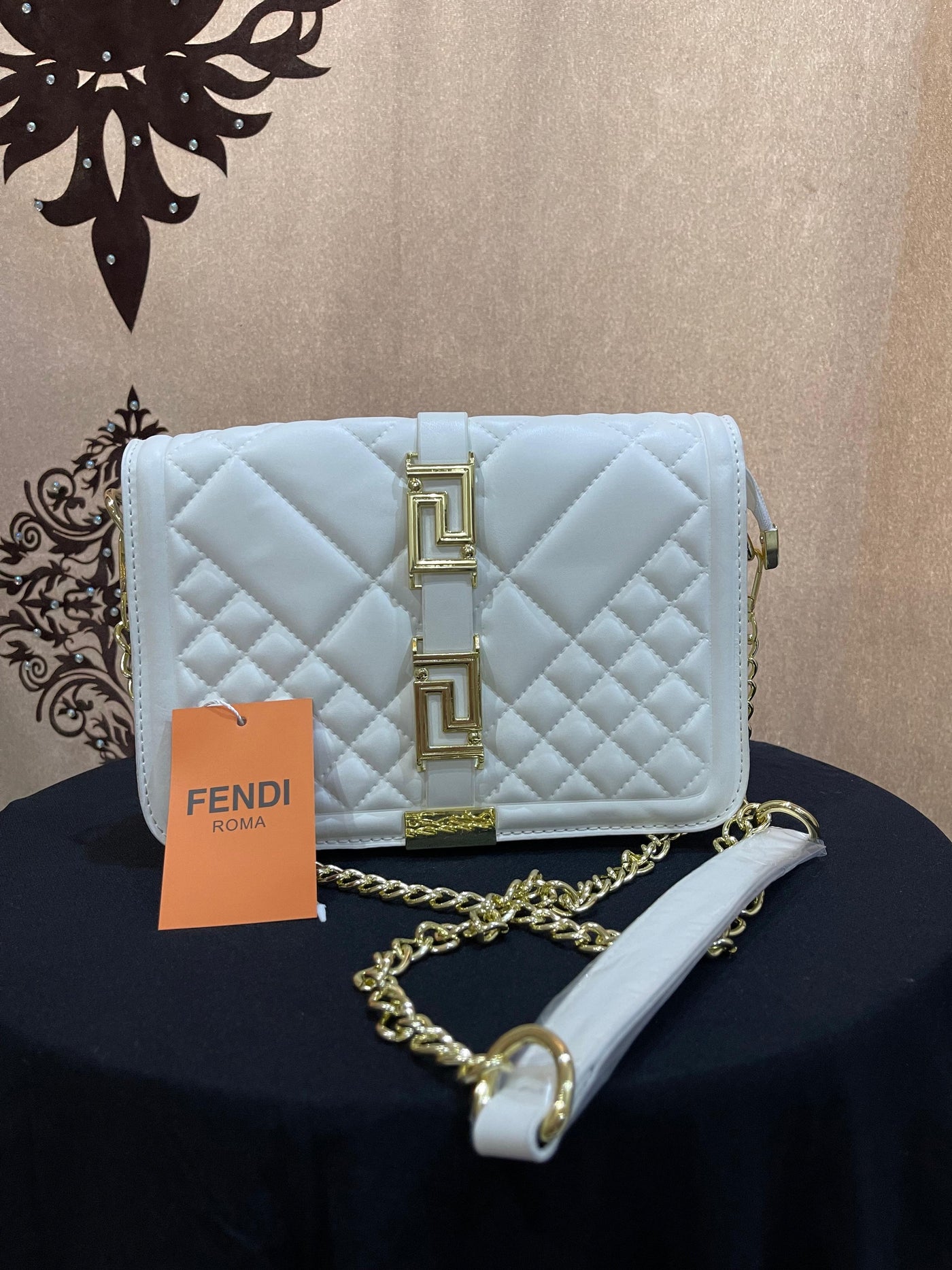 white hand bag